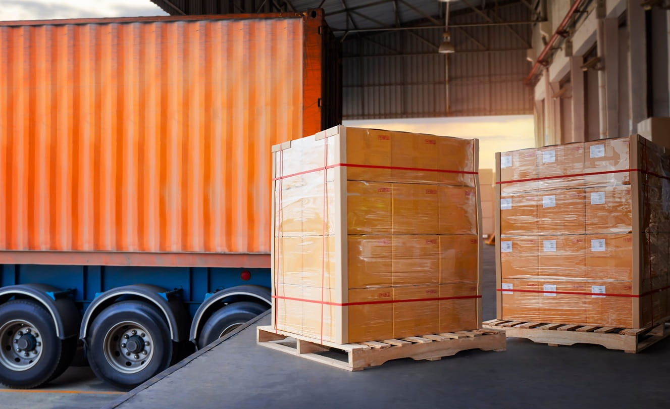 Wrapped pallets loading into container