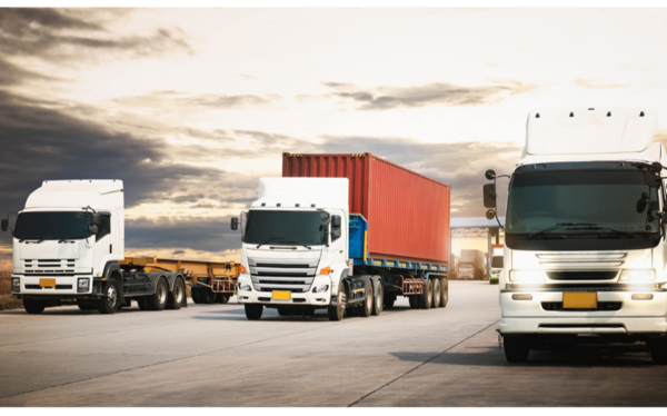 semi trailer trucks driving on the road